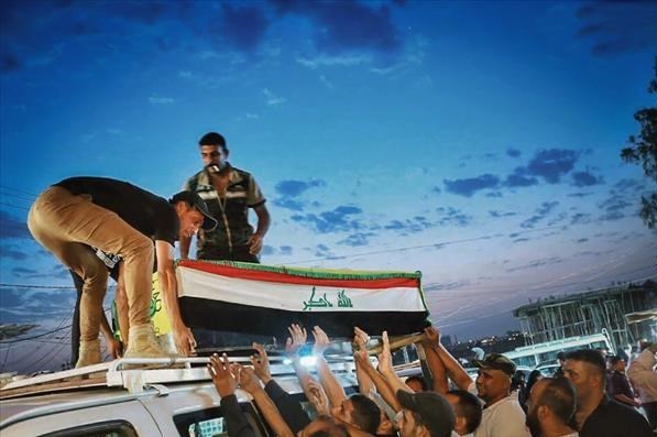 تصاویر/ تشییع شهدای «نُجَباء» در مثلث مرزی عراق، سوریه و اردن